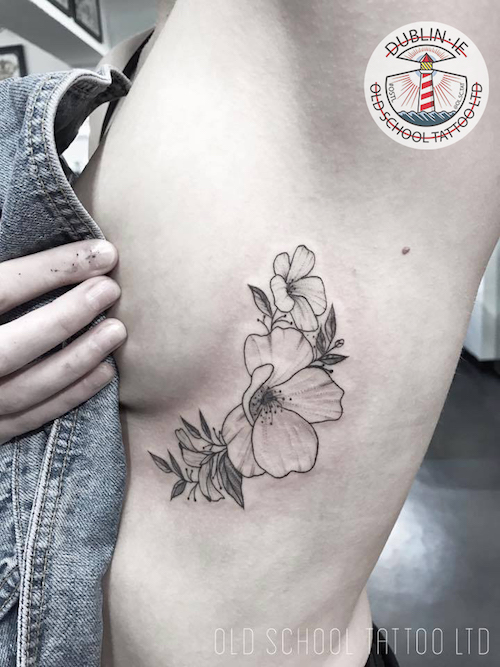ribs flower tattoo
